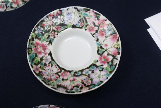 A Chinese ruby ground famille rose dish, early 20th century and a rice bowl, cover and stand